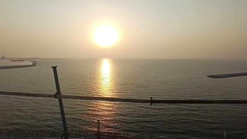 Sunset over the sea in the Dubai Islands construction walkthrough. Still from the construction video. The floor has not been confirmed.